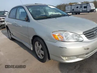 2003 Toyota Corolla CE with VIN 1NXBR32E63Z179629, listed as a IAAI auction lot 42043795 with 204,736 mi miles. Bid and sale history available at carsss.com. Image 6.