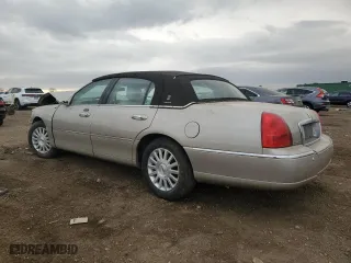 2004 Lincoln Town Car Signature with VIN 1LNHM81WX4Y606532, listed as a Copart auction lot 49666775 with 47,509 mi miles and Salvage Title. Bid and sale history available at carsss.com. Image 2.