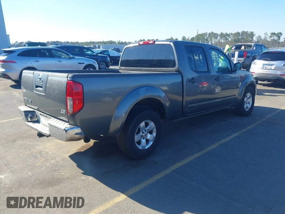 2009 Nissan Frontier LE with VIN 1N6AD09U79C402623, listed as a IAAI auction lot 41656385 with 286,777 mi miles and . Bid and sale history available at DreamBid. Image 4.