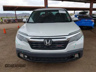 2019 Honda Ridgeline Sport with VIN 5FPYK3F10KB044218, listed as a IAAI auction lot 41907044 with 151,887 mi miles and . Bid and sale history available at DreamBid. Image 11.