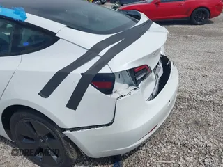 2022 Tesla Model 3 Long Range z VIN 5YJ3E1EB4NF165427, wystawiony jako IAAI lot #42290413 z przebiegiem 73 493 mil mil oraz . Historia ofert i sprzedaży dostępna na DreamBid. Obrazek 23.