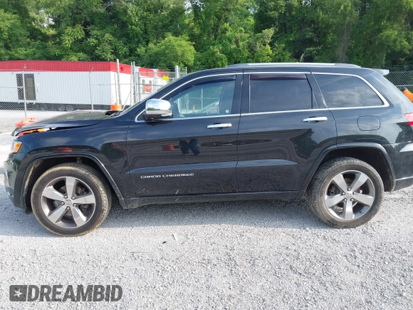 2016 Jeep Grand Cherokee Overland with VIN 1C4RJFCG3GC417699, listed as a IAAI auction lot 42419054 with 109,911 mi miles and . Bid and sale history available at DreamBid. Image 14.