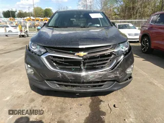 2021 Chevrolet Equinox LT with VIN 3GNAXJEV3ML389503, listed as a IAAI auction lot 41973286 with 99,878 mi miles and . Bid and sale history available at DreamBid. Image 6.