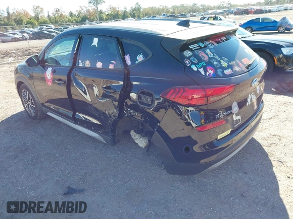 2019 Hyundai Tucson Sport with VIN KM8J33AL5KU902933, listed as a IAAI auction lot 41286316 with 73,799 mi miles. Bid and sale history available at carsss.com. Image 3.