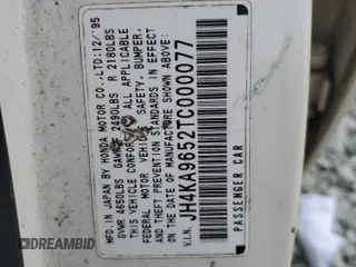 1996 Acura RL with VIN JH4KA9652TC000077, listed as a Copart auction lot 82430394 with 201,807 mi miles and Salvage Title. Bid and sale history available at carsss.com. Image 12.