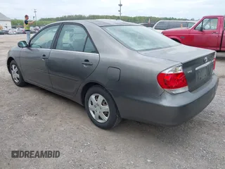 2006 Toyota Camry STD with VIN JTDBE30K063039692, listed as a IAAI auction lot 42121296 with 109,687 mi miles. Bid and sale history available at carsss.com. Image 3.