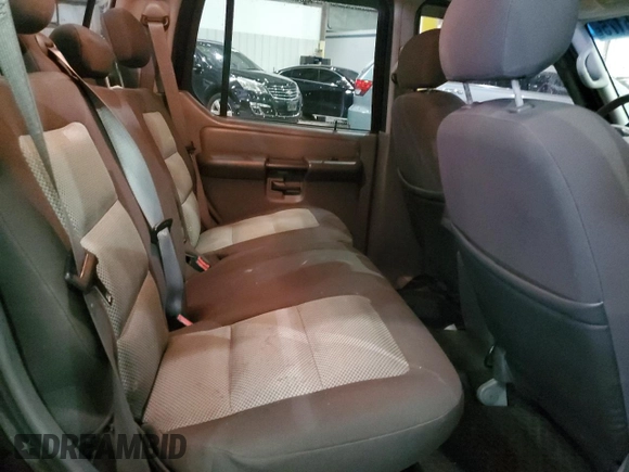 2005 Ford Explorer Sport Trac XLS с VIN 1FMZU77KX5UB67697, выставлен на аукционе Copart как лот 45185175 с пробегом 131 572 миль миль и На запчасти • Non repairable. История ставок и продаж доступна на DreamBid. Изображение 10.