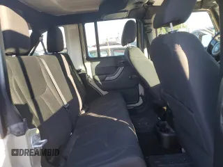 2018 Jeep Wrangler JK Unlimited Sport S with VIN 1C4BJWDG9JL870345, listed as a Copart auction lot 68056124 with 111,377 mi miles and Salvage Title. Bid and sale history available at carsss.com. Image 11.