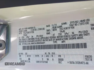 2016 Ford Escape Titanium with VIN 1FMCU9J96GUB65441, listed as a IAAI auction lot 41412223 with 74,218 mi miles. Bid and sale history available at carsss.com. Image 9.
