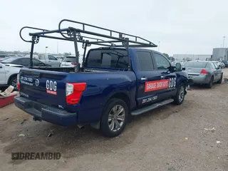 2018 Nissan Titan SV with VIN 1N6AA1E69JN500096, listed as a IAAI auction lot 41883390 with 136,752 mi miles and . Bid and sale history available at DreamBid. Image 4.
