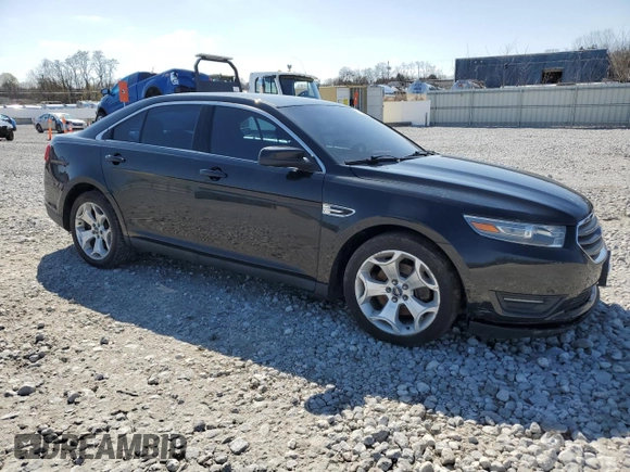 2014 Ford Taurus SEL with VIN 1FAHP2E85EG119210, listed as a Copart auction lot 51581795 with 165,128 mi miles and Salvage Title. Bid and sale history available at DreamBid. Image 4.
