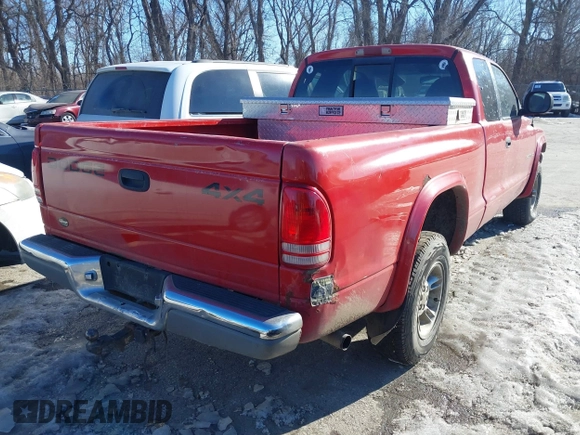 1999 Dodge Dakota SLT with VIN 1B7GG22Y3XS289253, listed as a IAAI auction lot 41283728 with 154,038 mi miles and . Bid and sale history available at carsss.com. Image 4.