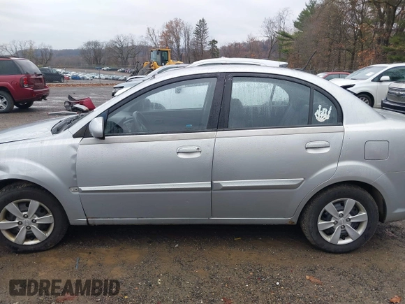 2010 Kia Rio LX with VIN KNADH4A37A6645279, listed as a IAAI auction lot 40856780 with 165,385 mi miles. Bid and sale history available at carsss.com. Image 14.