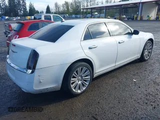 2011 Chrysler 300 with VIN 2C3CA6CT9BH581181, listed as a IAAI auction lot 41981733 with 156,460 mi miles. Bid and sale history available at carsss.com. Image 4.