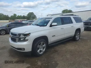 2017 Chevrolet Suburban LT z VIN 1GNSCHKC8HR330084, wystawiony jako Copart lot #52335325 z przebiegiem Nie podano mil oraz Szkoda całkowita • Salvage title. Historia ofert i sprzedaży dostępna na DreamBid. Obrazek 1.