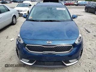 2019 Kia Niro Touring with VIN KNDCE3LCXK5345712, listed as a Copart auction lot 61921284 with 57,903 mi miles and Salvage Title. Bid and sale history available at carsss.com. Image 5.