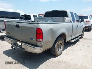 1997 Ford F-150 with VIN 1FTDX1762VKD10644, listed as a IAAI auction lot 42405458 with 215,835 mi miles and . Bid and sale history available at DreamBid. Image 4.