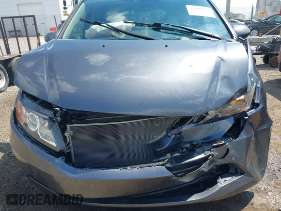 2014 Honda Odyssey EX-L with VIN 5FNRL5H60EB117218, listed as a IAAI auction lot 42201739 with 184,586 mi miles and . Bid and sale history available at DreamBid. Image 12.