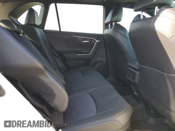 2021 Toyota RAV4 Hybrid XSE with VIN 2T3E6RFV1MW018990, listed as a Copart auction lot 64043865 with 55,938 mi miles and Salvage title. Bid and sale history available at DreamBid. Image 11.