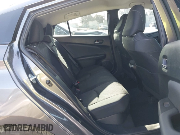 2021 Toyota Prius LE with VIN JTDKAMFP1M3195662, listed as a IAAI auction lot 42799476 with 47,560 mi miles and . Bid and sale history available at DreamBid. Image 8.