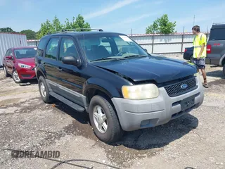 2001 Ford Escape XLS with VIN 1FMYU01101KB23118, listed as a IAAI auction lot 42460285 with 233,139 mi miles and . Bid and sale history available at DreamBid. Image 1.