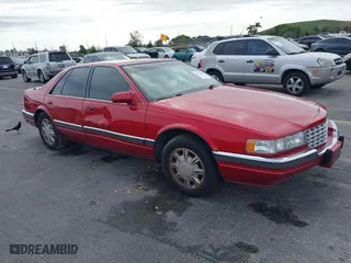 1995 Cadillac Seville Luxury SLS with VIN 1G6KS52Y7SU833943, listed as a IAAI auction lot 40873559 with 1 mi miles. Bid and sale history available at carsss.com. Image 1.