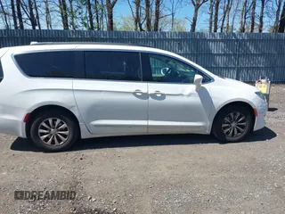 2017 Chrysler Pacifica Touring L with VIN 2C4RC1BG0HR821230, listed as a IAAI auction lot 42158120 with 98,354 mi miles and . Bid and sale history available at DreamBid. Image 13.