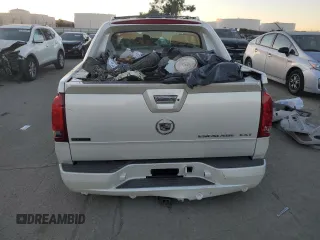 2004 Cadillac Escalade EXT z VIN 3GYEK62N94G256810, wystawiony jako Copart lot #85347844 z przebiegiem Nie podano mil oraz Szkoda całkowita • Salvage title. Historia ofert i sprzedaży dostępna na DreamBid. Obrazek 6.