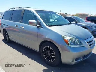 2006 Honda Odyssey EX-L with VIN 5FNRL38736B093902, listed as a IAAI auction lot 41812491 with 147,770 mi miles. Bid and sale history available at carsss.com. Image 1.