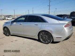 2015 Lincoln MKZ z VIN 3LN6L2G9XFR610736, wystawiony jako Copart lot #80662274 z przebiegiem 101 441 mil mil oraz Szkoda całkowita • Salvage title. Historia ofert i sprzedaży dostępna na DreamBid. Obrazek 2.
