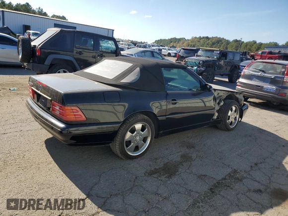 1999 Mercedes-Benz SL-Class with VIN WDBFA68F1XF184891, listed as a Copart auction lot 77082284 with 96,379 mi miles and Salvage Title. Bid and sale history available at carsss.com. Image 3.