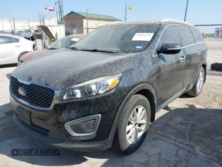 2017 Kia Sorento LX with VIN 5XYPG4A30HG242934, listed as a IAAI auction lot 41856236 with 164,664 mi miles. Bid and sale history available at carsss.com. Image 2.