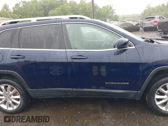 2014 Jeep Cherokee Limited with VIN 1C4PJMDS0EW277301, listed as a IAAI auction lot 42357034 with 61,825 mi miles and . Bid and sale history available at DreamBid. Image 13.