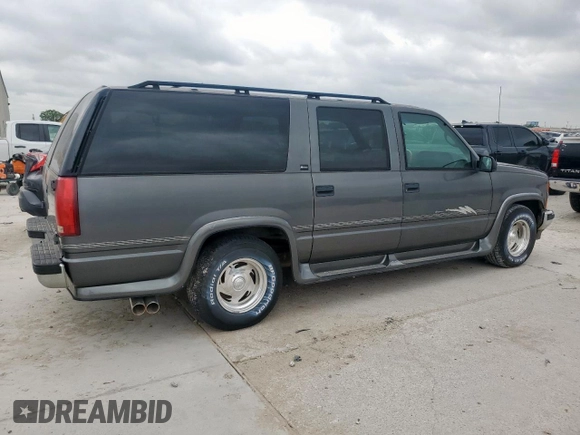 1999 Chevrolet Suburban with VIN 1GBEC16R0XJ434453, listed as a Copart auction lot 54711725 with 179,597 mi miles and Clean title. Bid and sale history available at DreamBid. Image 3.