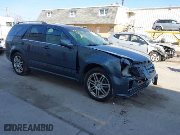 2008 Cadillac SRX AWD with VIN 1GYEE437580158105, listed as a IAAI auction lot 41777201 with 136,561 mi miles. Bid and sale history available at carsss.com. Image 1.