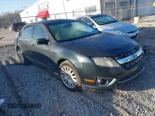 2010 Ford Fusion Hybrid with VIN 3FADP0L32AR100367, listed as a IAAI auction lot 41770303 with 253,334 mi miles. Bid and sale history available at carsss.com. Image 1.