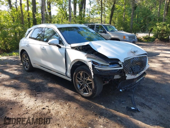 2023 Genesis GV70 2.5T z VIN KMUMADTB9PU098982, wystawiony jako IAAI lot #42335587 z przebiegiem 20 215 mil mil oraz . Historia ofert i sprzedaży dostępna na DreamBid. Obrazek 1.