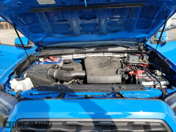 2020 Toyota Tacoma SR5 z VIN 3TMCZ5AN6LM310164, wystawiony jako Copart lot #47098995 z przebiegiem 18 285 mil mil oraz Szkoda całkowita • Salvage title. Historia ofert i sprzedaży dostępna na DreamBid. Obrazek 12.