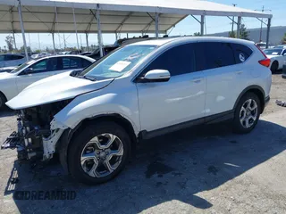2019 Honda CR-V EX z VIN 5J6RW1H59KA012571, wystawiony jako IAAI lot #41830202 z przebiegiem 49 987 mil mil oraz . Historia ofert i sprzedaży dostępna na DreamBid. Obrazek 2.