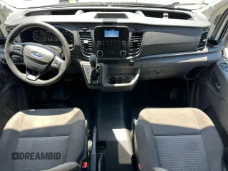 2020 Ford Transit Cargo z VIN 1FTBR1CG3LKB36452, wystawiony jako Copart lot #58659545 z przebiegiem 171 504 mil mil oraz Tytuł czysty. Historia ofert i sprzedaży dostępna na DreamBid. Obrazek 9.