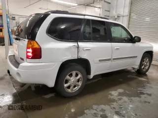 2002 GMC Envoy SLT with VIN 1GKDT13S822472292, listed as a Copart auction lot 52749785 with 172,211 mi miles and Salvage Title. Bid and sale history available at carsss.com. Image 3.