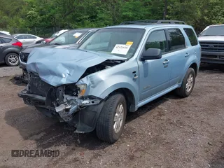 2008 Mercury Mariner with VIN 4M2CU81178KJ28804, listed as a IAAI auction lot 42123626 with 168,134 mi miles and . Bid and sale history available at DreamBid. Image 2.