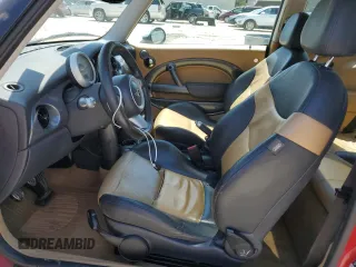 2005 MINI Hardtop S with VIN WMWRE33475TD92831, listed as a Copart auction lot 55299615 with 155,632 mi miles and Salvage title. Bid and sale history available at DreamBid. Image 7.