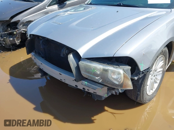 2013 Dodge Charger SE with VIN 2C3CDXBG7DH742812, listed as a IAAI auction lot 41991577 with 124,057 mi miles and . Bid and sale history available at DreamBid. Image 6.