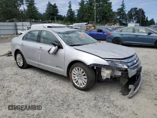 2012 Ford Fusion Hybrid с VIN 3FADP0L30CR284761, выставлен на аукционе Copart как лот 61286445 с пробегом 171 073 миль миль и Списание • Salvage title. История ставок и продаж доступна на DreamBid. Изображение 4.