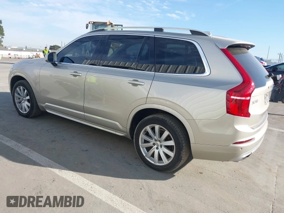 2016 Volvo XC90 T6 Momentum with VIN YV4A22PK5G1071505, listed as a IAAI auction lot 41702501 with 154,679 mi miles. Bid and sale history available at carsss.com. Image 3.