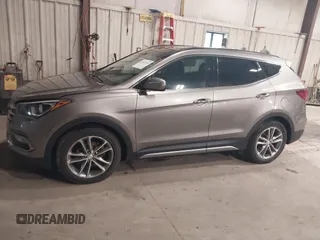 2017 Hyundai Santa Fe 2.0T with VIN 5XYZUDLA4HG424259, listed as a IAAI auction lot 42657783 with 213,040 mi miles and . Bid and sale history available at DreamBid. Image 14.