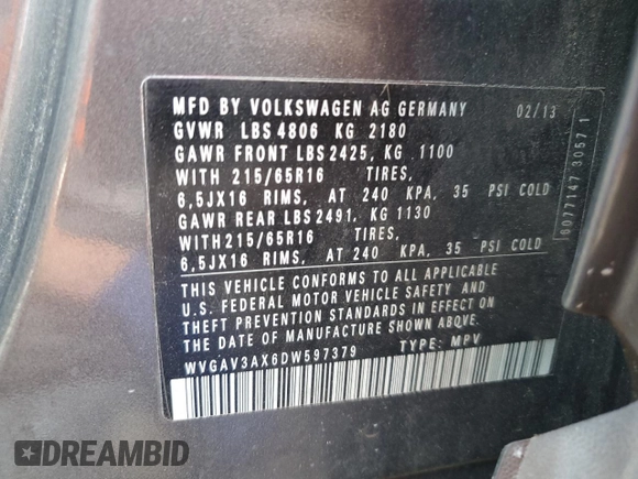 2013 Volkswagen Tiguan S z VIN WVGAV3AX6DW597379, wystawiony jako Copart lot #56386515 z przebiegiem 100 415 mil mil oraz Czysty tytuł • Clean title. Historia ofert i sprzedaży dostępna na DreamBid. Obrazek 14.