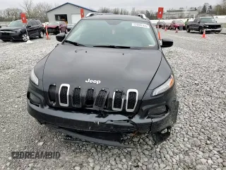 2015 Jeep Cherokee Latitude with VIN 1C4PJLCB9FW706934, listed as a Copart auction lot 52696105 with 125,205 mi miles and Salvage Title. Bid and sale history available at DreamBid. Image 11.