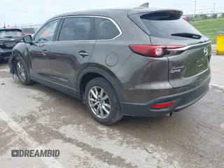 2017 Mazda CX-9 Touring z VIN JM3TCACY7H0129335, wystawiony jako IAAI lot #42289926 z przebiegiem 60 425 mil mil oraz . Historia ofert i sprzedaży dostępna na DreamBid. Obrazek 3.
